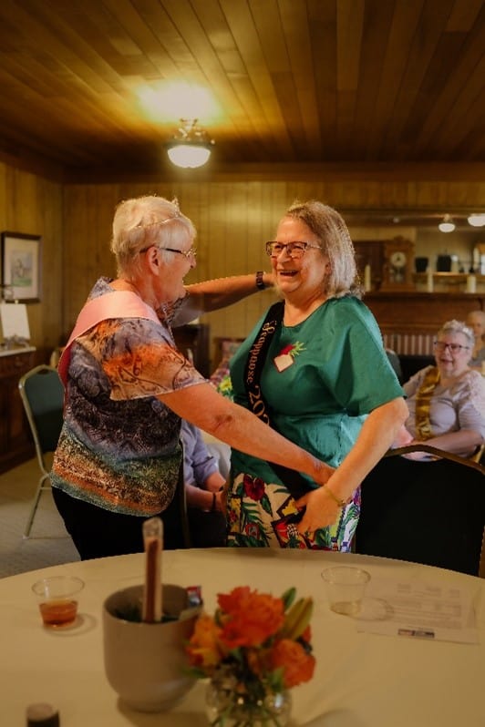Pat Turpin, from Scappoose, being crowned at the Tea by previous princess
